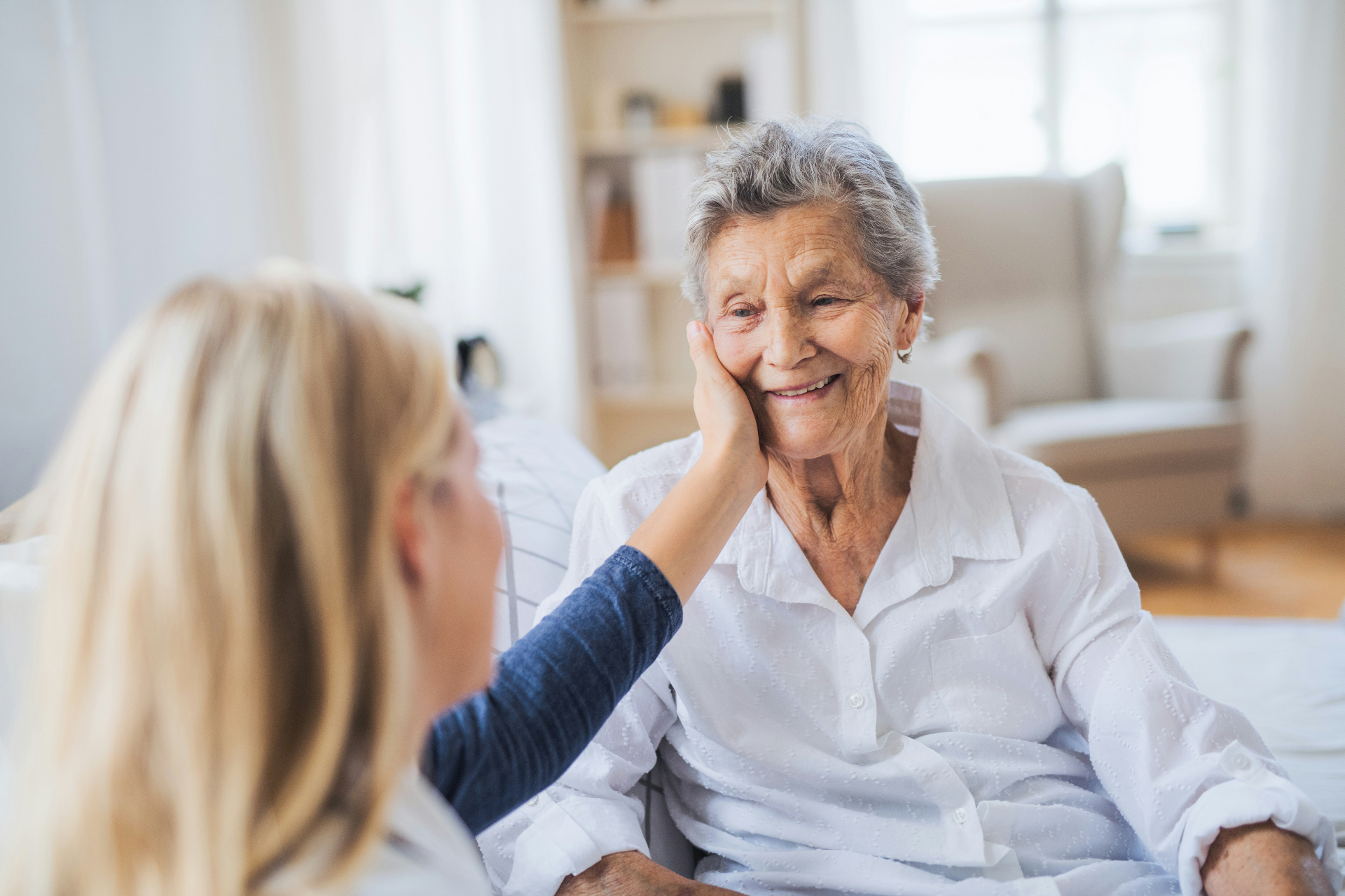 Family touring an assisted living facility with a staff member